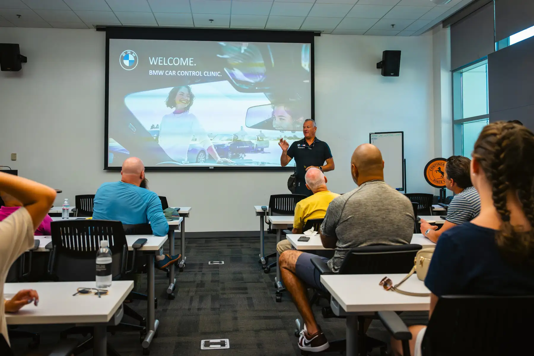 Instructor opening a BMW Car Control Clinic classroom session
