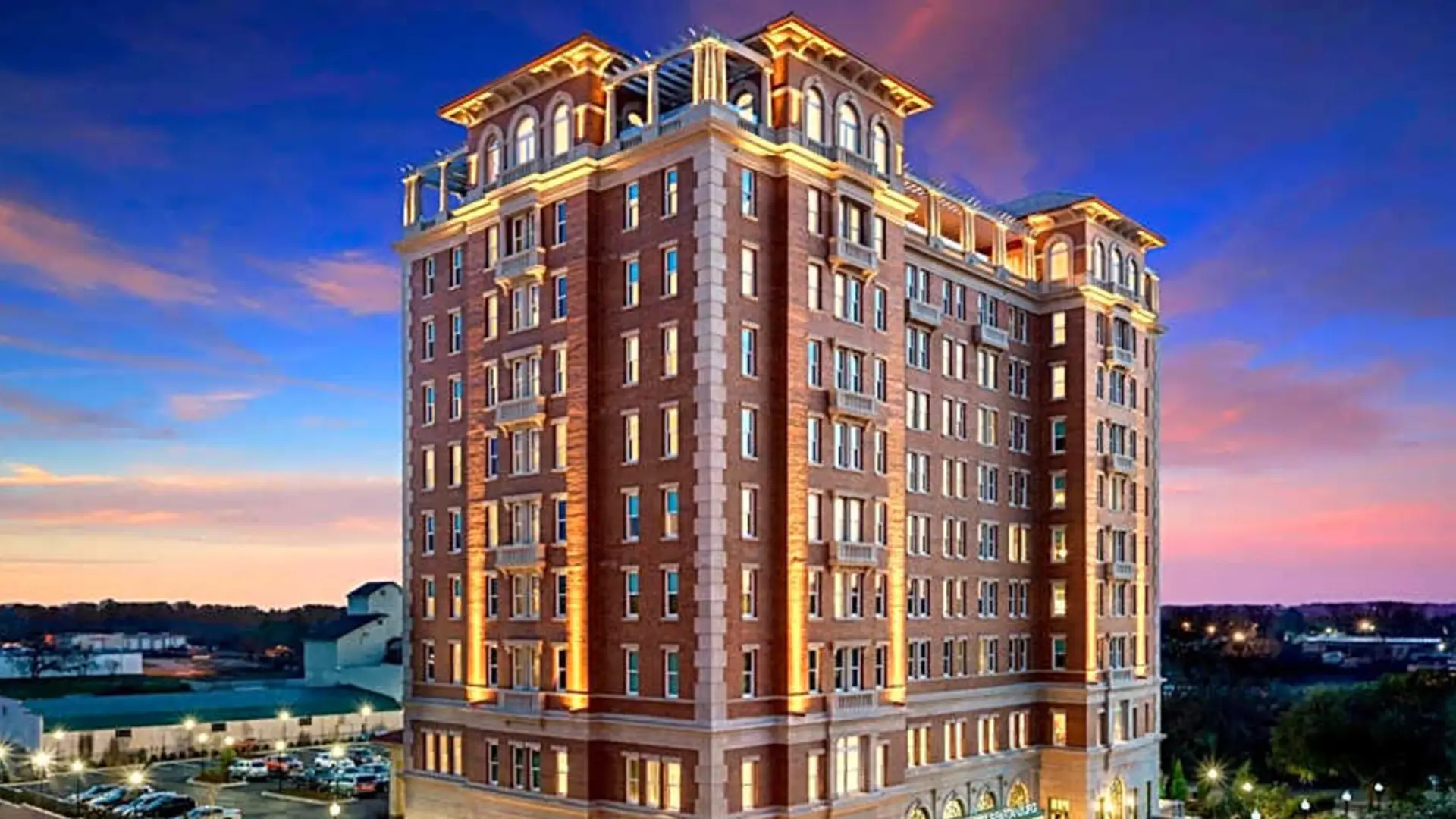 AC Hotel Spartanburg lit at sunset