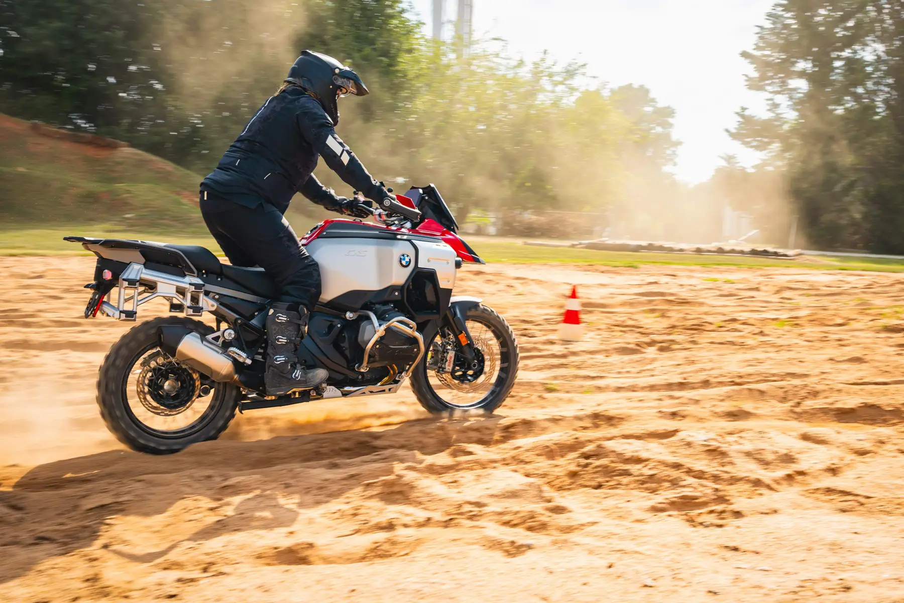 Rider on a BMW GS riding through deep sand