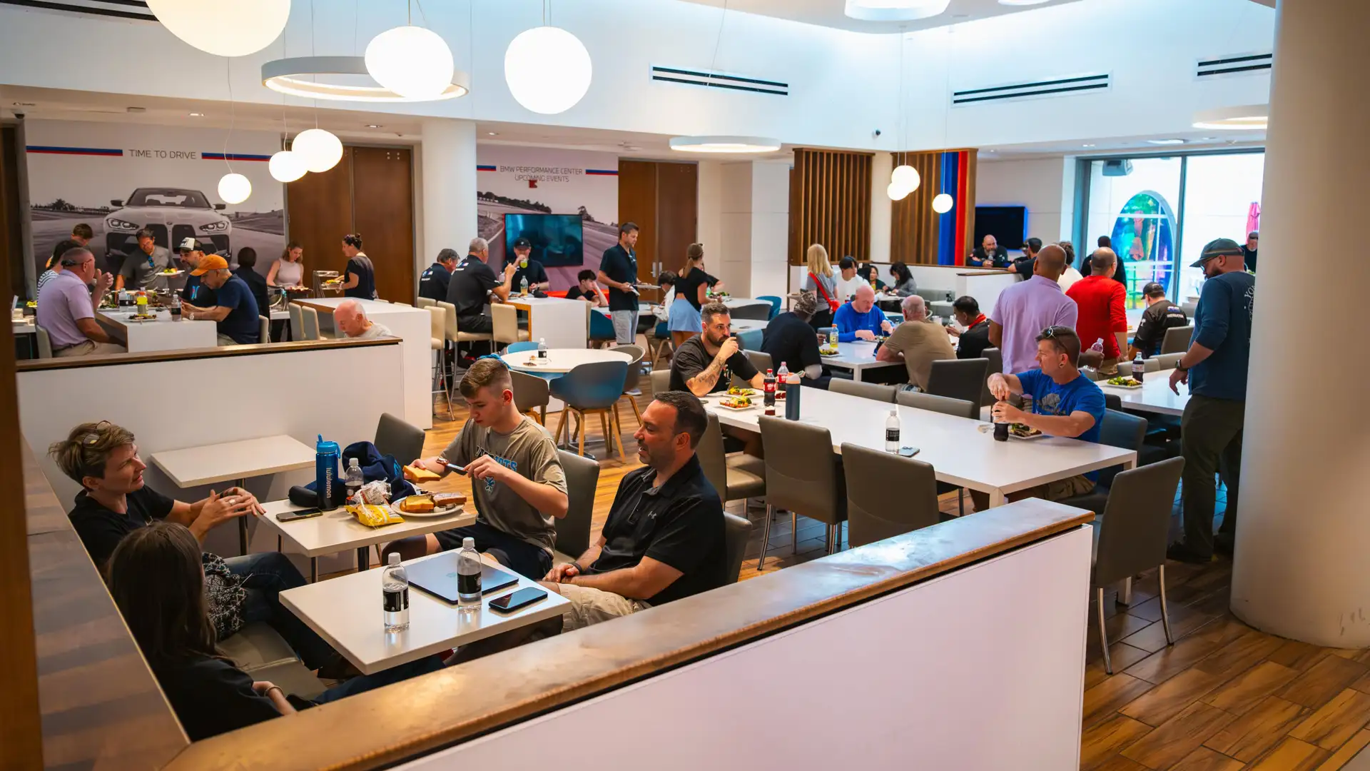 Guests dining in the BMW M Cafe at the Performance Center