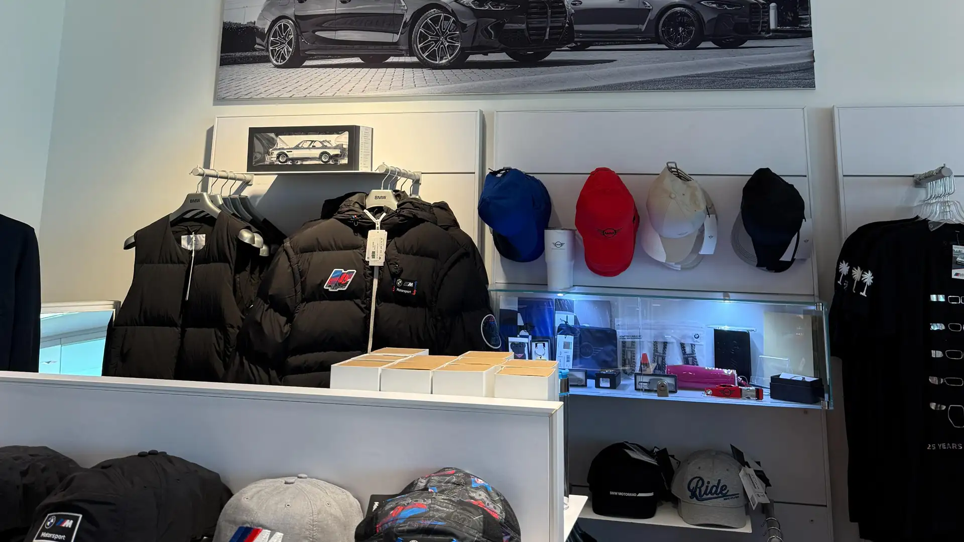 BMW gift shop display of jackets, caps and accessories