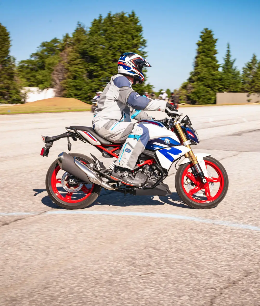 Rider on a BMW G 310 R riding across the training pad