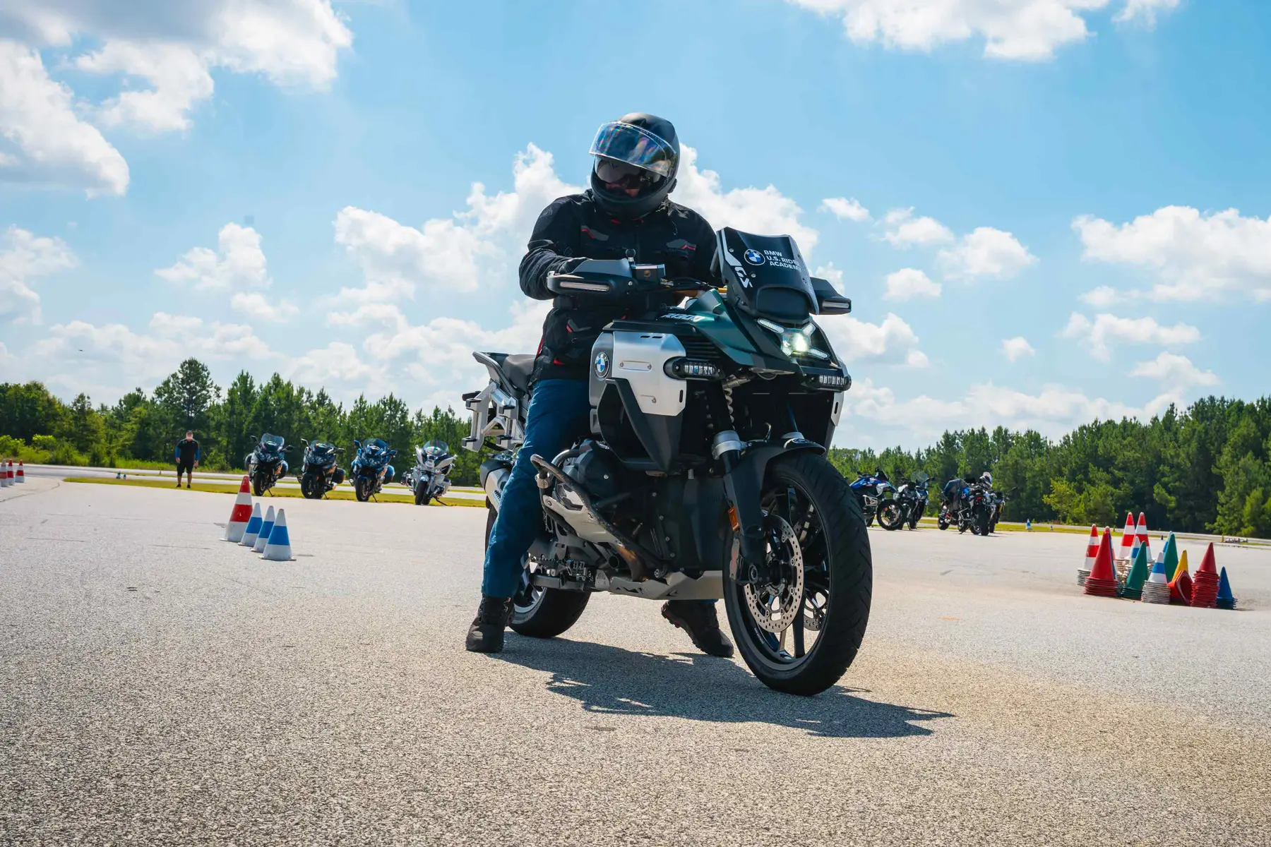 Rider on a BMW GS at the start of a coned exercise on the paved pad