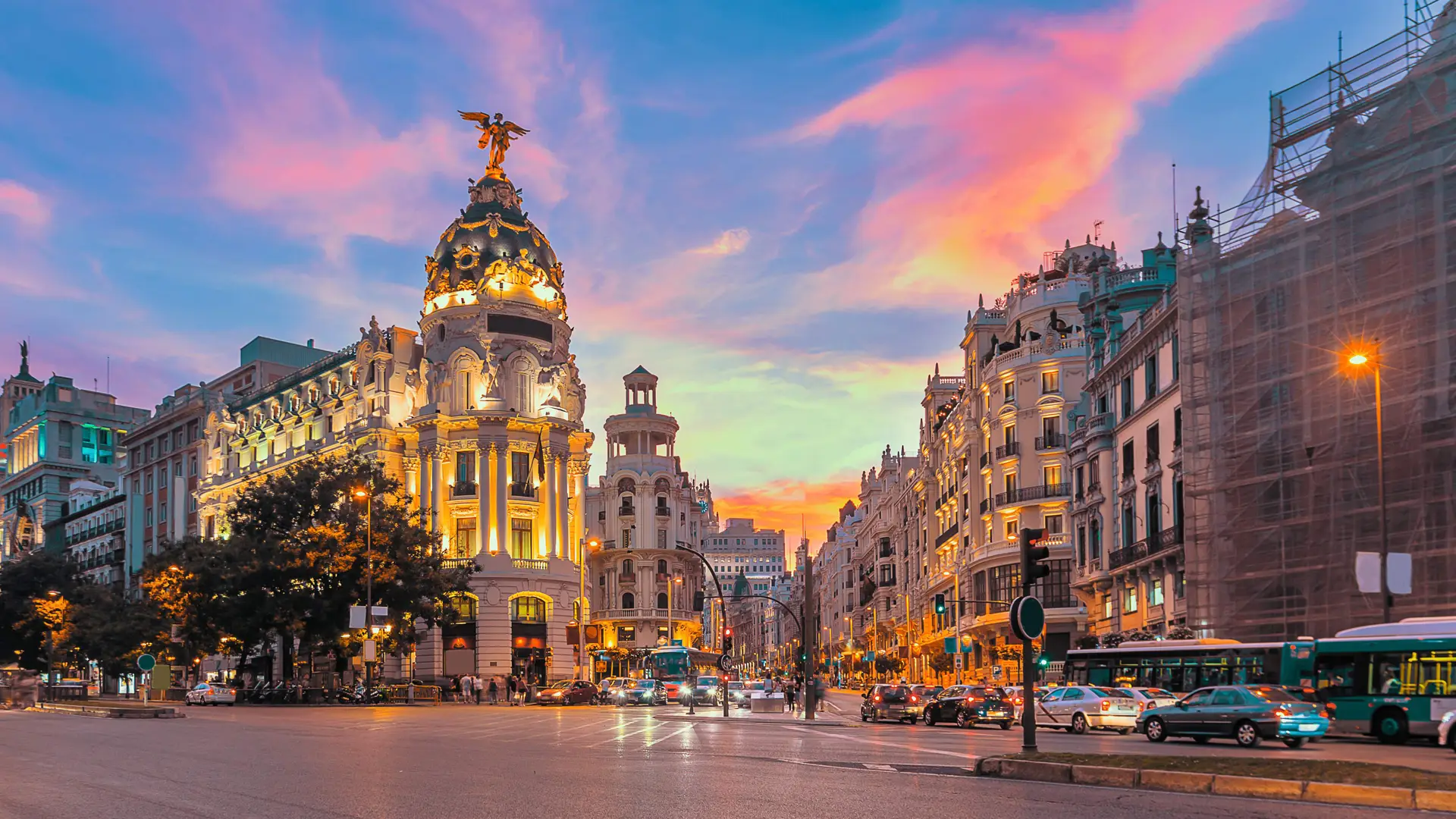 The Metropolis building on Madrid's Gran Via at sunset