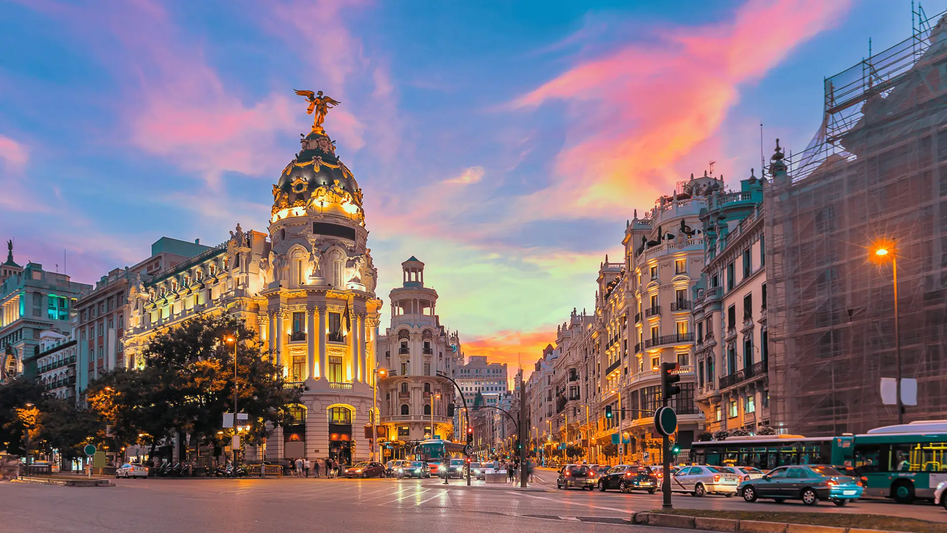 The Metropolis building on Madrid's Gran Via at sunset