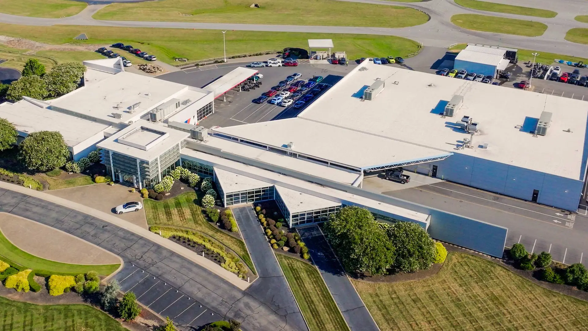 Aerial view of the BMW Performance Center buildings and car park